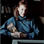 Me in 1989, with my 1985 book, Compassion the Ultimate Ethic: An Exploration of Veganism.